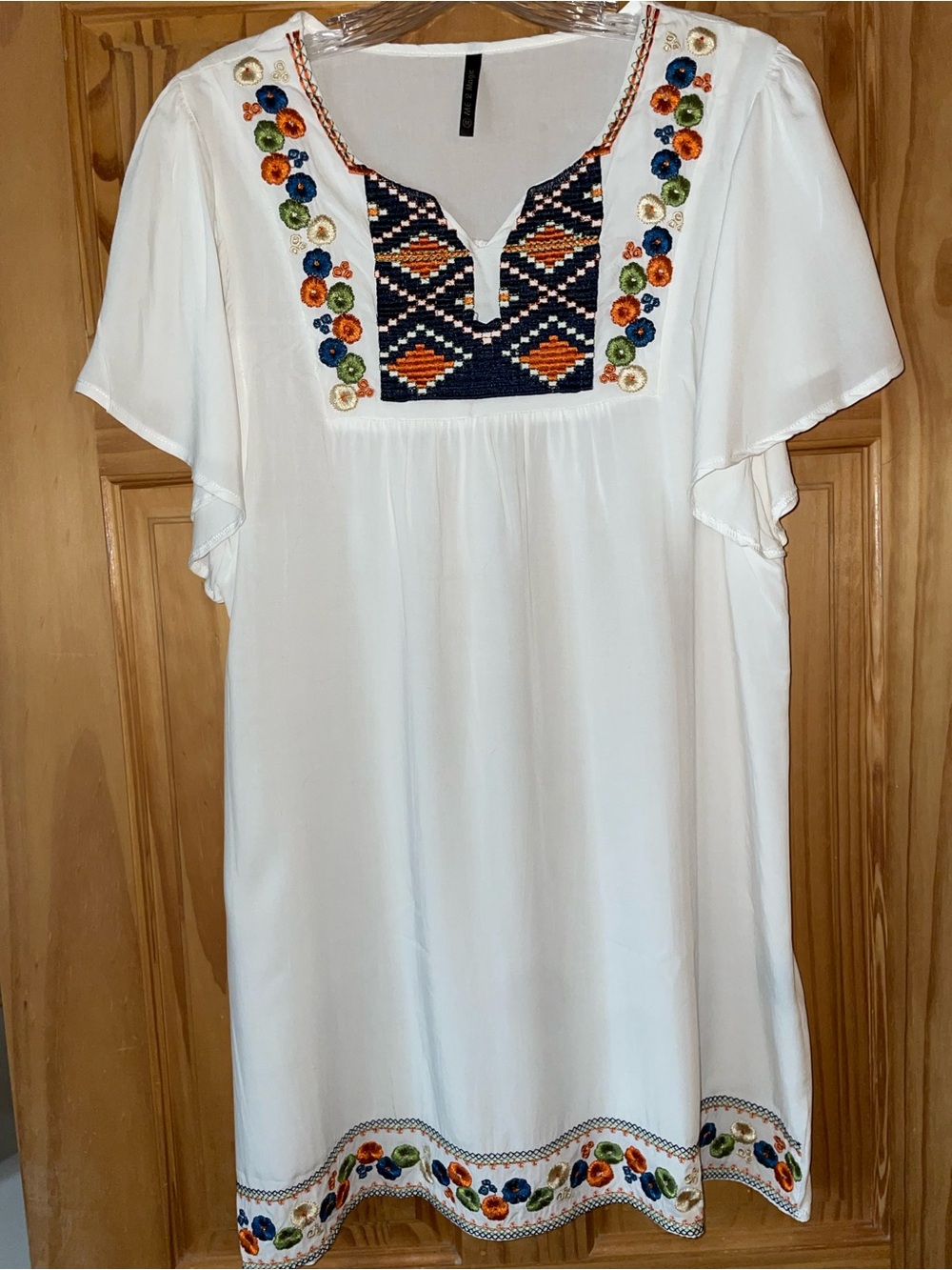 White Embroidered Mini Dress with Floral Accent